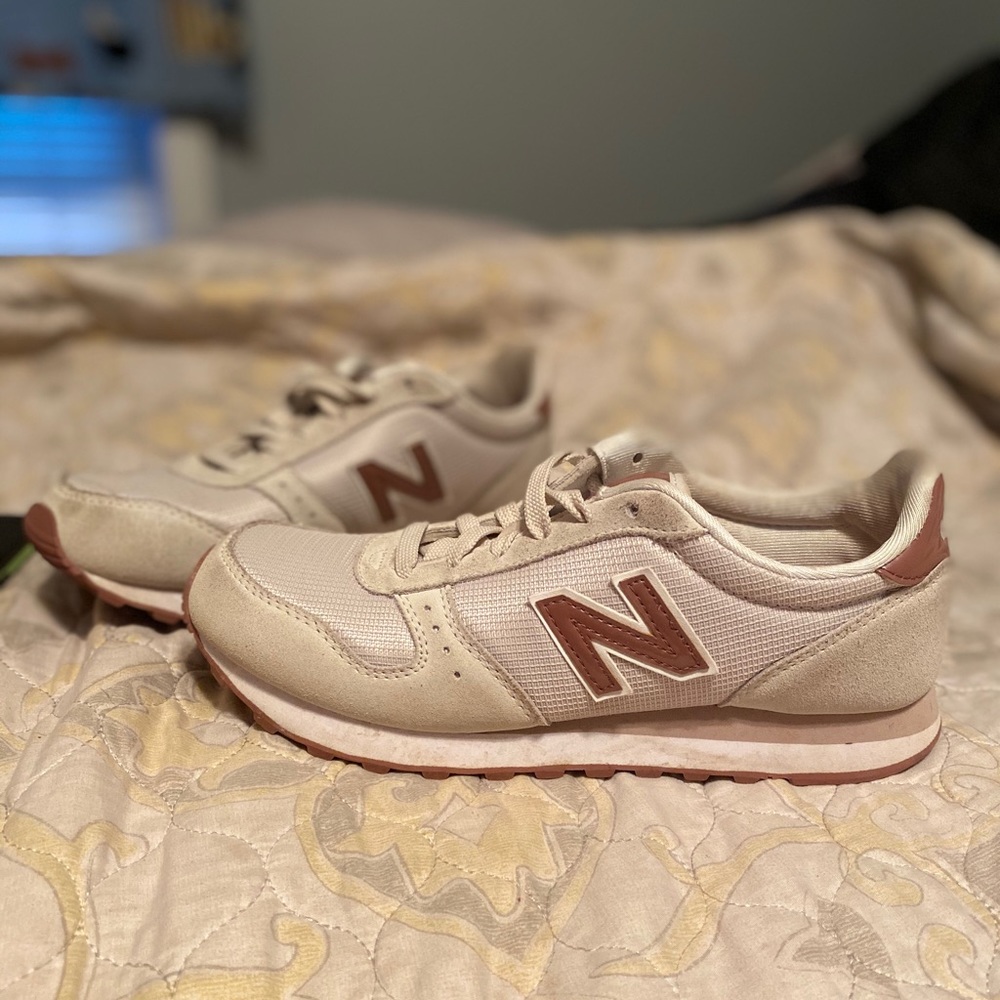 Cream/pink New Balance 311s